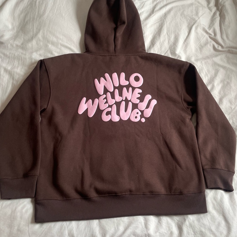 Brown Hoodie with Pink "Wilo Wellness Club" Graphic